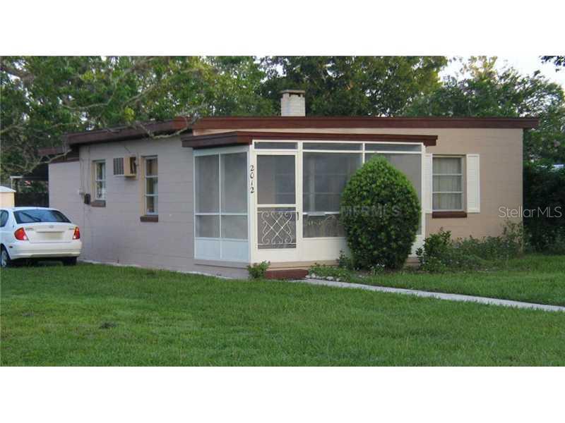 Exterior Front - Cute 2 bedroom concrete block home with screened in front porch.  Central heat and air, inside utility room, carpet in living room and bedrooms, covered patio and storage sheds for your use.  Call today to see this cute bungalow.