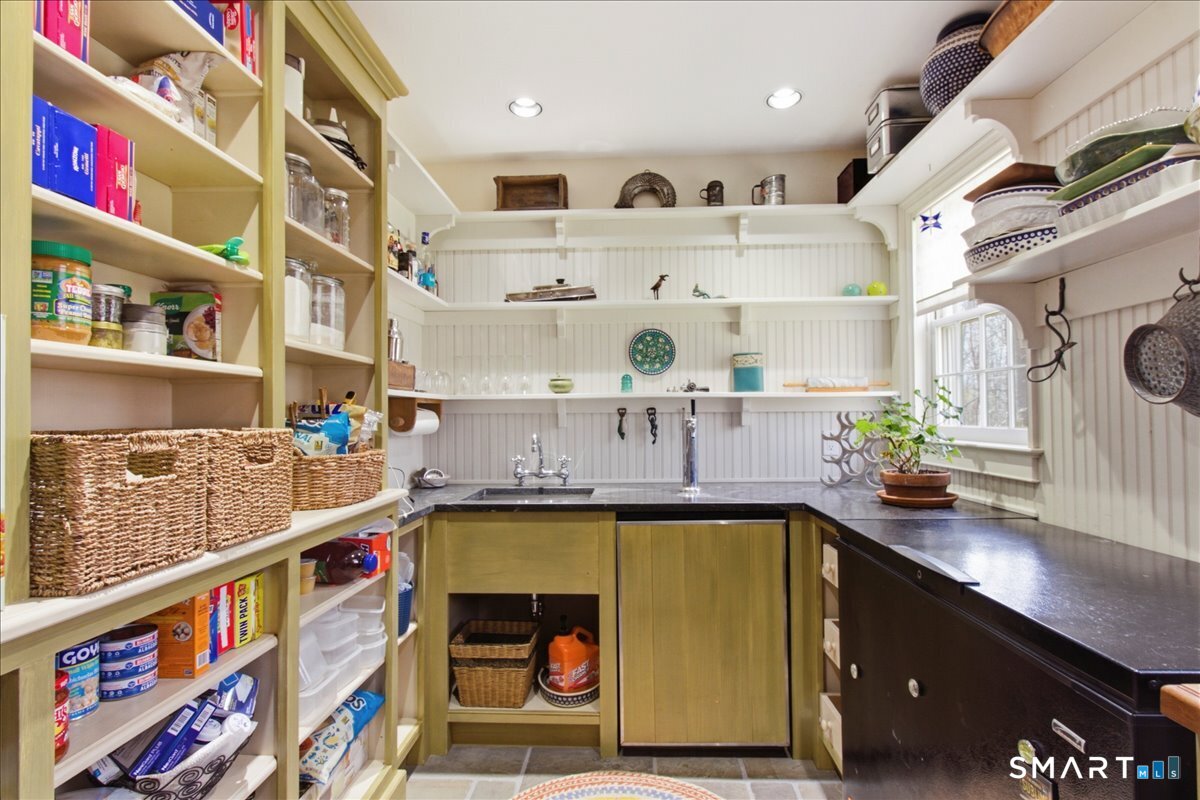 56 Gold Mine Road Roxbury, CT 06783 - Photo 11 of 40 Space for all of your provisions with sink, wine fridge and fish/game freezer.