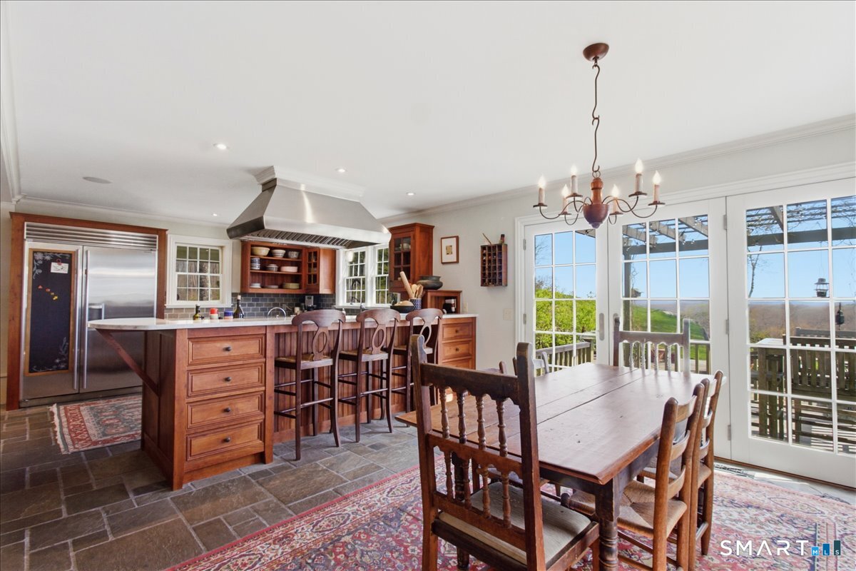 56 Gold Mine Road Roxbury, CT 06783 - Photo 13 of 40 French doors to outdoor dining.