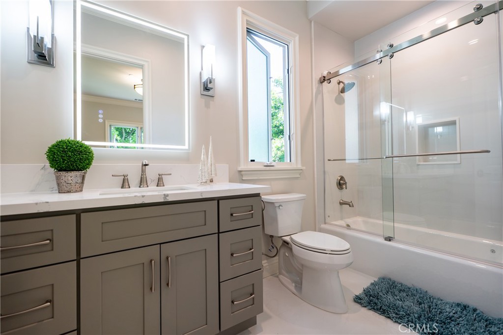 894 Fallen Leaf Road Arcadia, CA 91006 - Photo 20 of 28 a bathroom with a sink toilet tub and shower