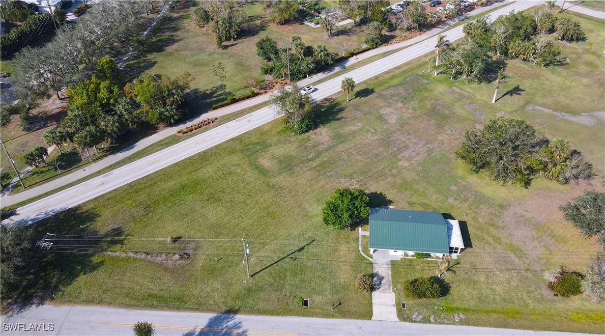 590 Shreve Street Punta Gorda, FL 33950 - Photo 3 of 10 an aerial view of a house with a yard