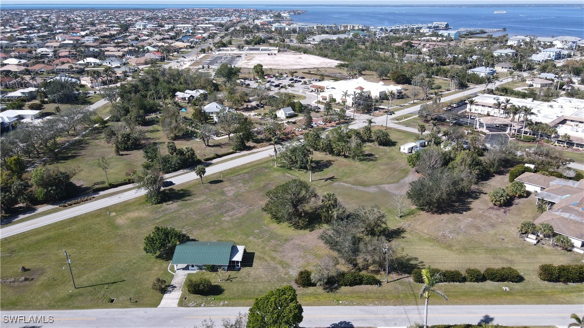 590 Shreve Street Punta Gorda, FL 33950 - Photo 4 of 10 an aerial view of residential houses with outdoor space