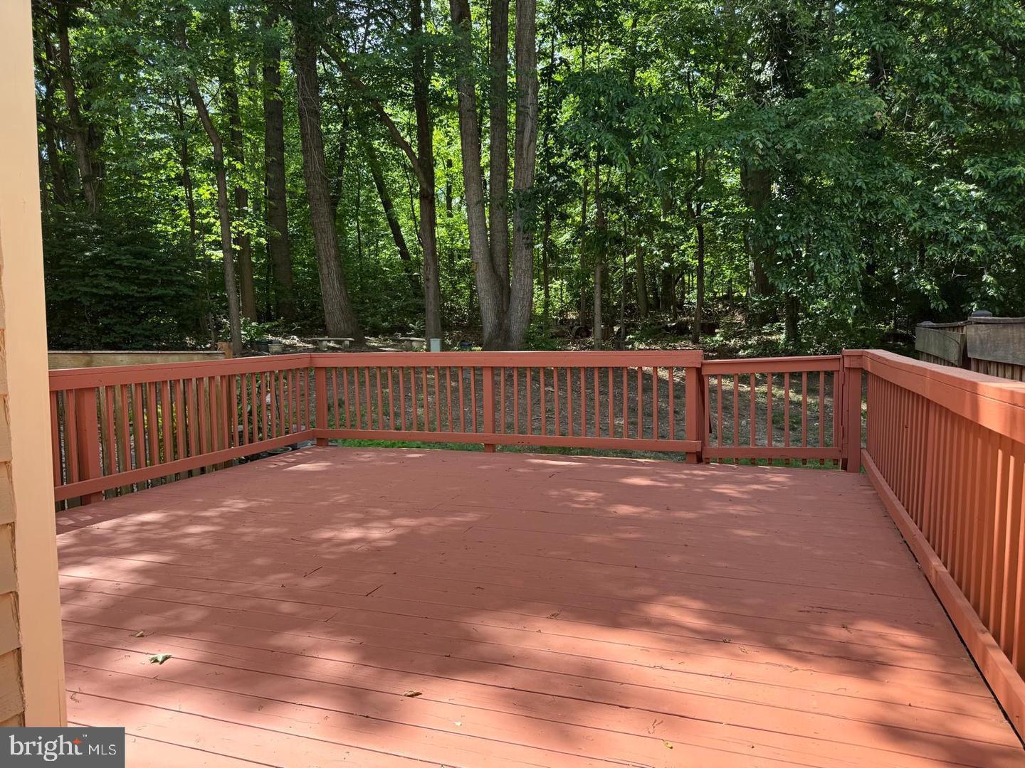 1631 Oak Spring Way Reston, VA 20190 - Photo 10 of 10 a view of a deck with a large trees