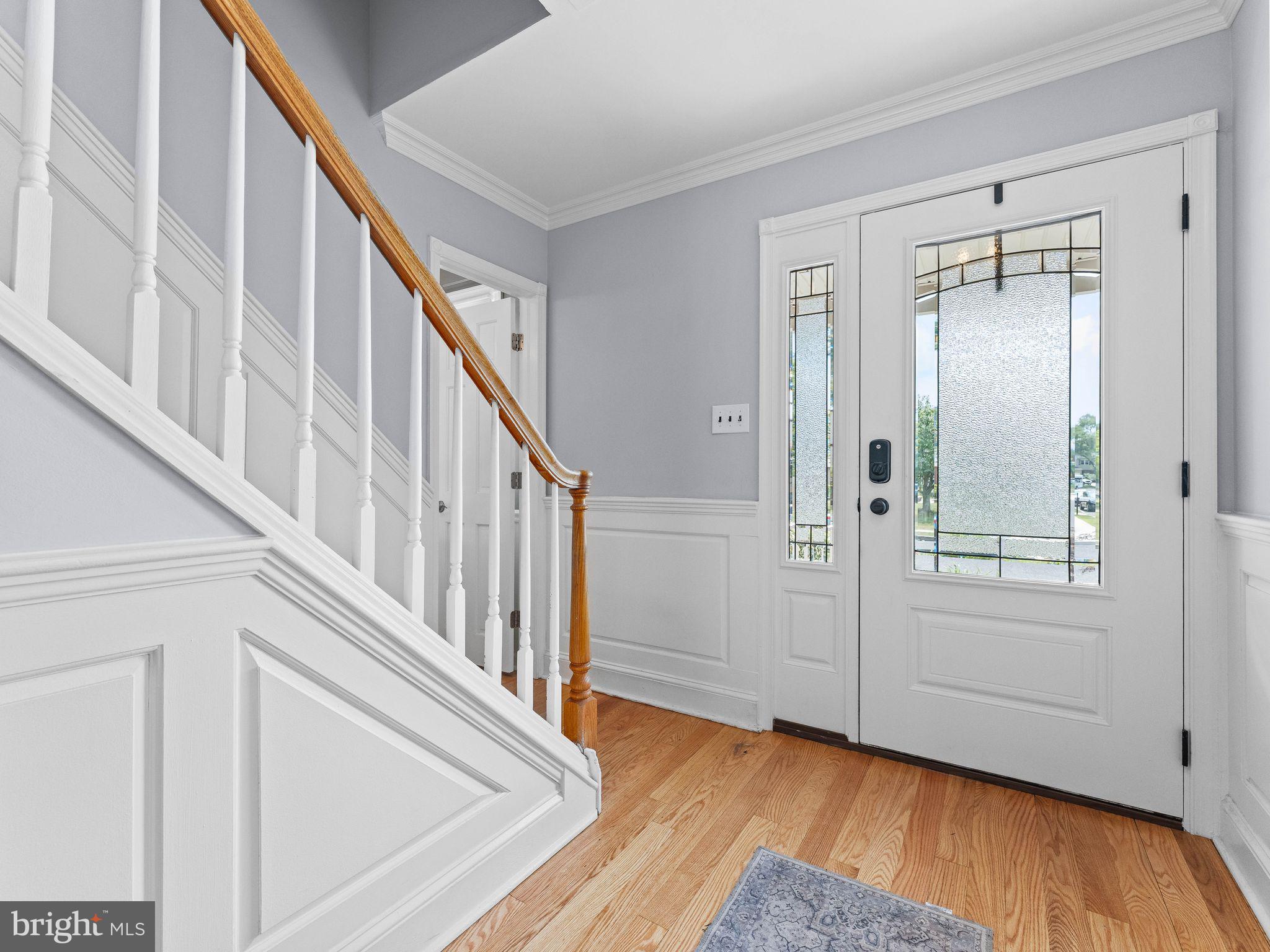 8 Chesterfield Road Sewell, NJ 08080 - Photo 7 of 57 a view of an entryway with wooden floor and door