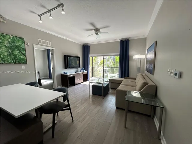 a bedroom with a bed and a mirror