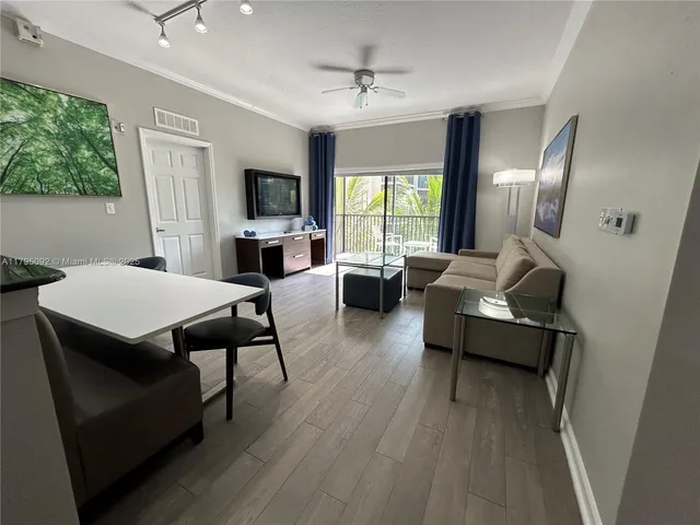 a bedroom with a bed and a mirror