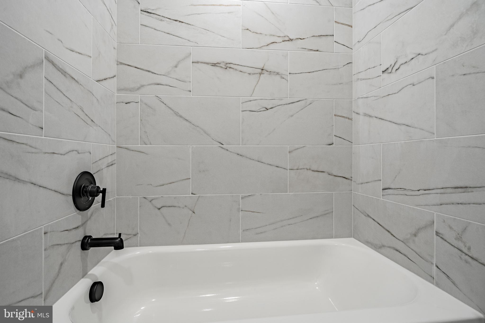 231 Laurel Bridge Road Landenberg, PA 19350 - Photo 17 of 57 a bathroom with a bathtub