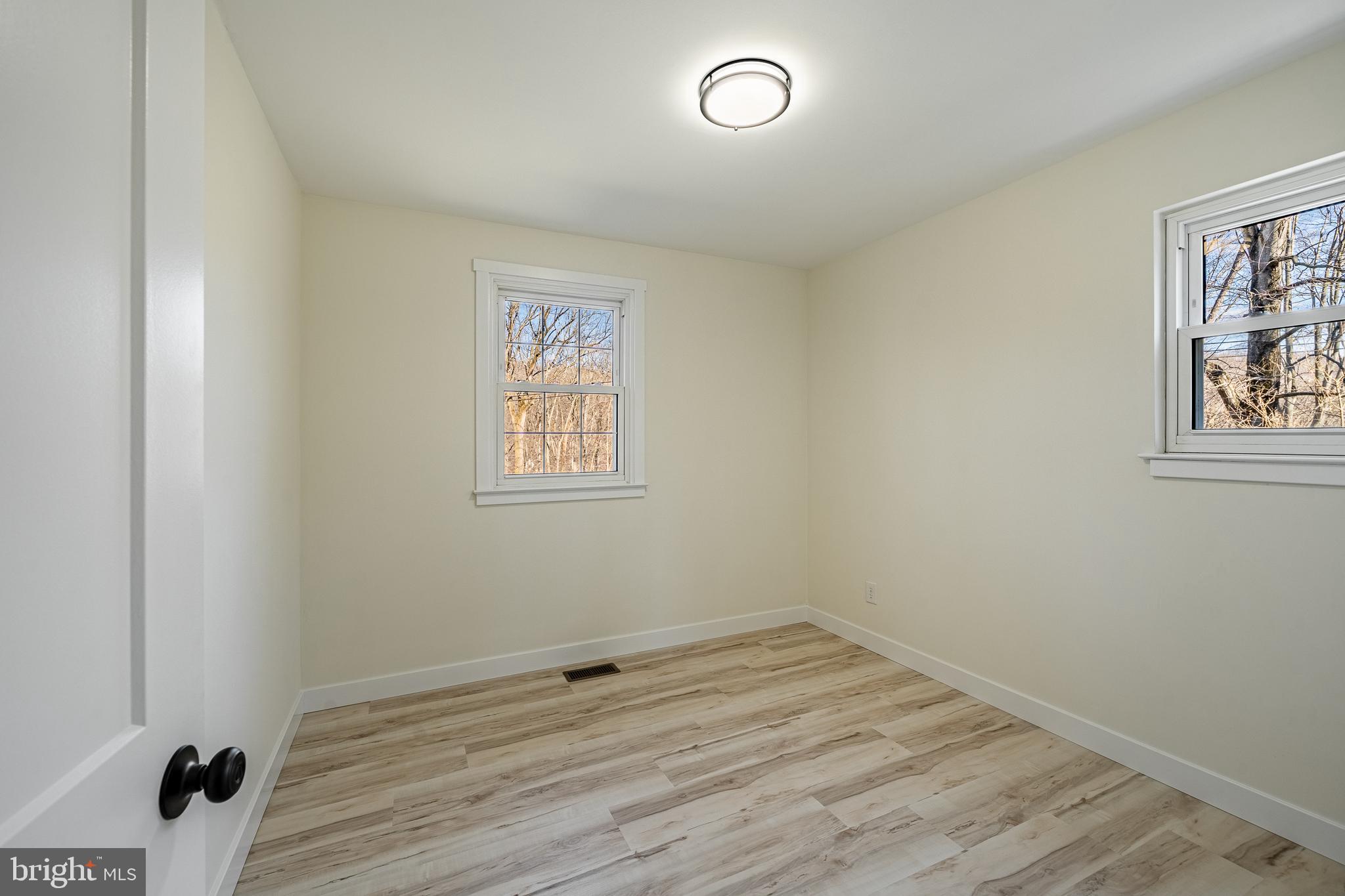 231 Laurel Bridge Road Landenberg, PA 19350 - Photo 20 of 57 wooden floor in an empty room
