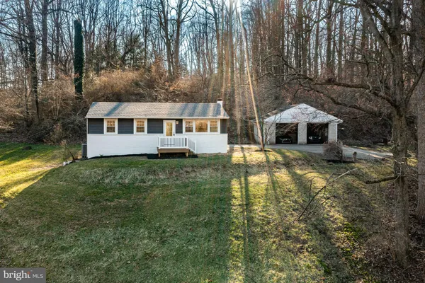 a view of a backyard of a house