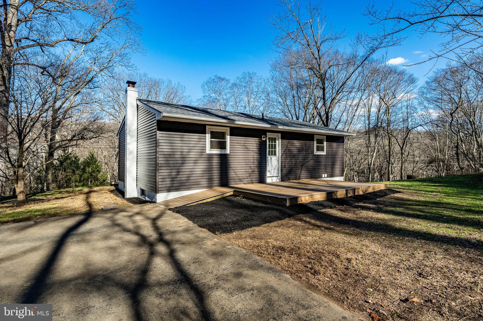 231 Laurel Bridge Road Landenberg, PA 19350 - Photo 37 of 57 a view of a house with backyard and trees