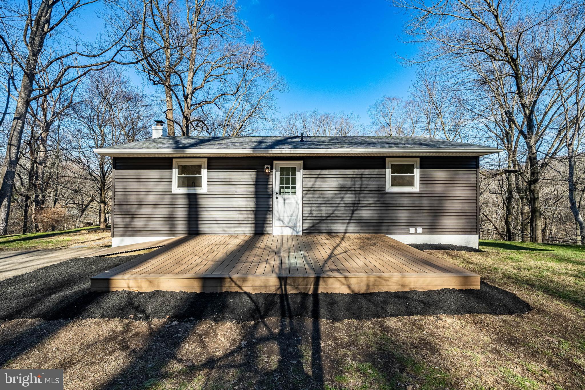 231 Laurel Bridge Road Landenberg, PA 19350 - Photo 40 of 57 a view of a house with backyard and trees