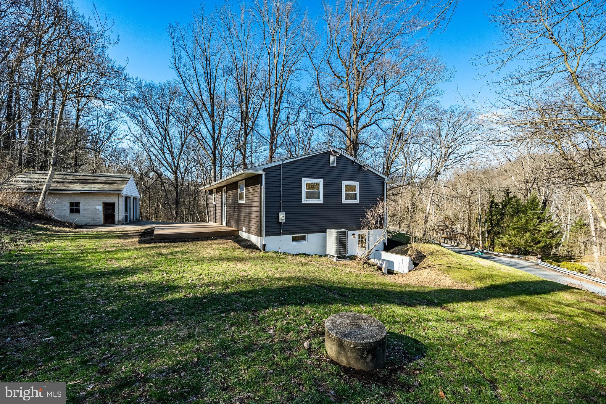 231 Laurel Bridge Road Landenberg, PA 19350 - Photo 42 of 57 a view of a house with backyard and trees