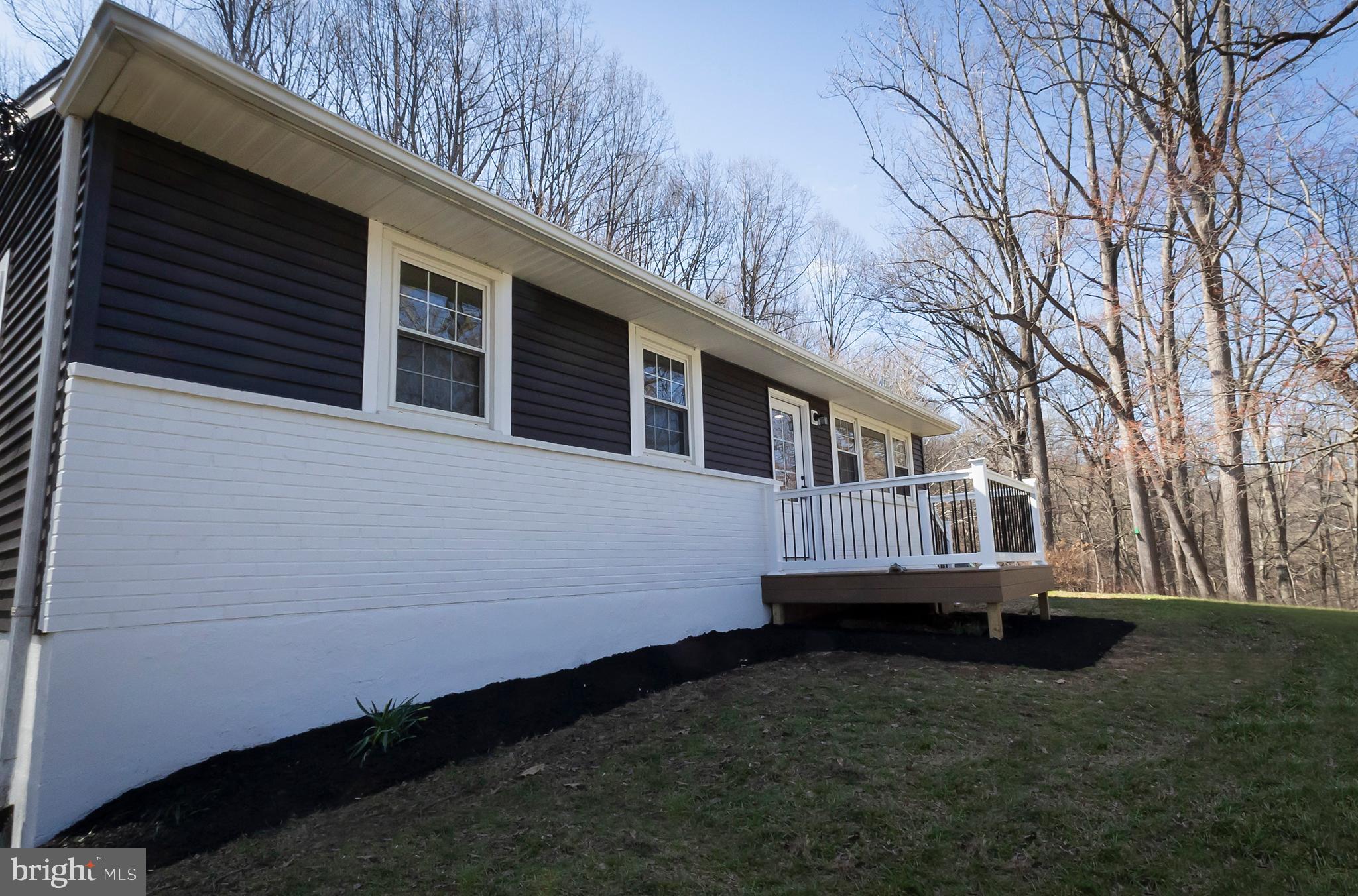 231 Laurel Bridge Road Landenberg, PA 19350 - Photo 45 of 57 a view of a house with a yard