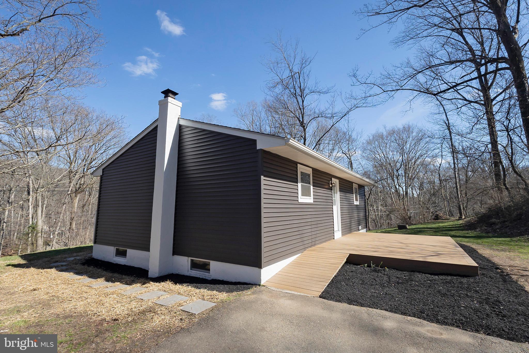 231 Laurel Bridge Road Landenberg, PA 19350 - Photo 47 of 57 a view of a house with a yard