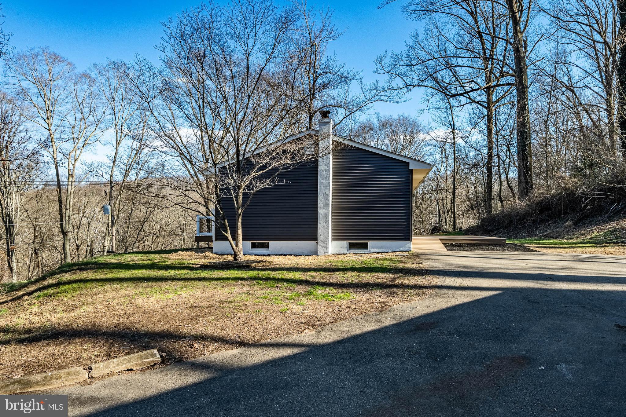231 Laurel Bridge Road Landenberg, PA 19350 - Photo 49 of 57 a view of a house with a yard