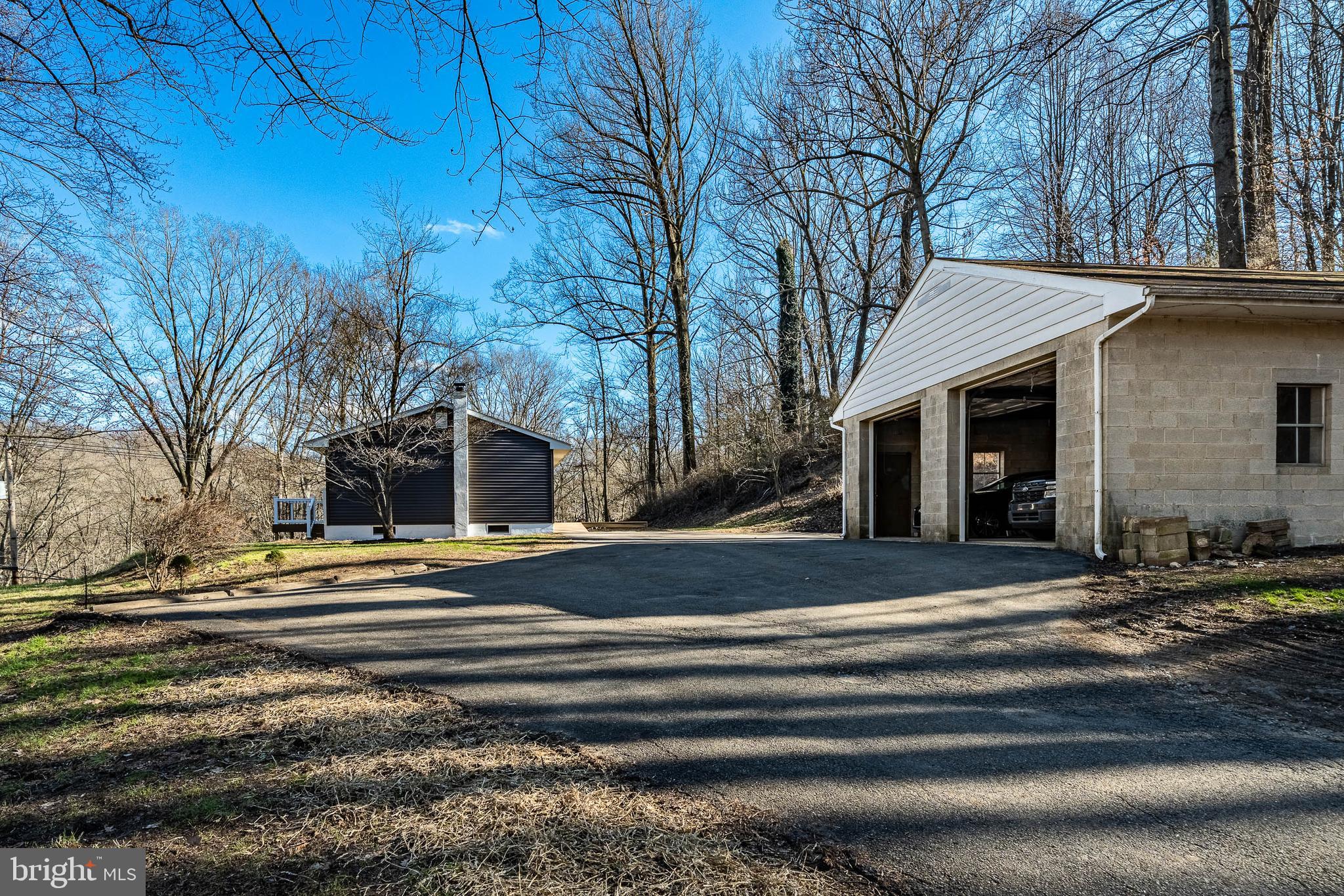 231 Laurel Bridge Road Landenberg, PA 19350 - Photo 50 of 57 a view of a house with a yard