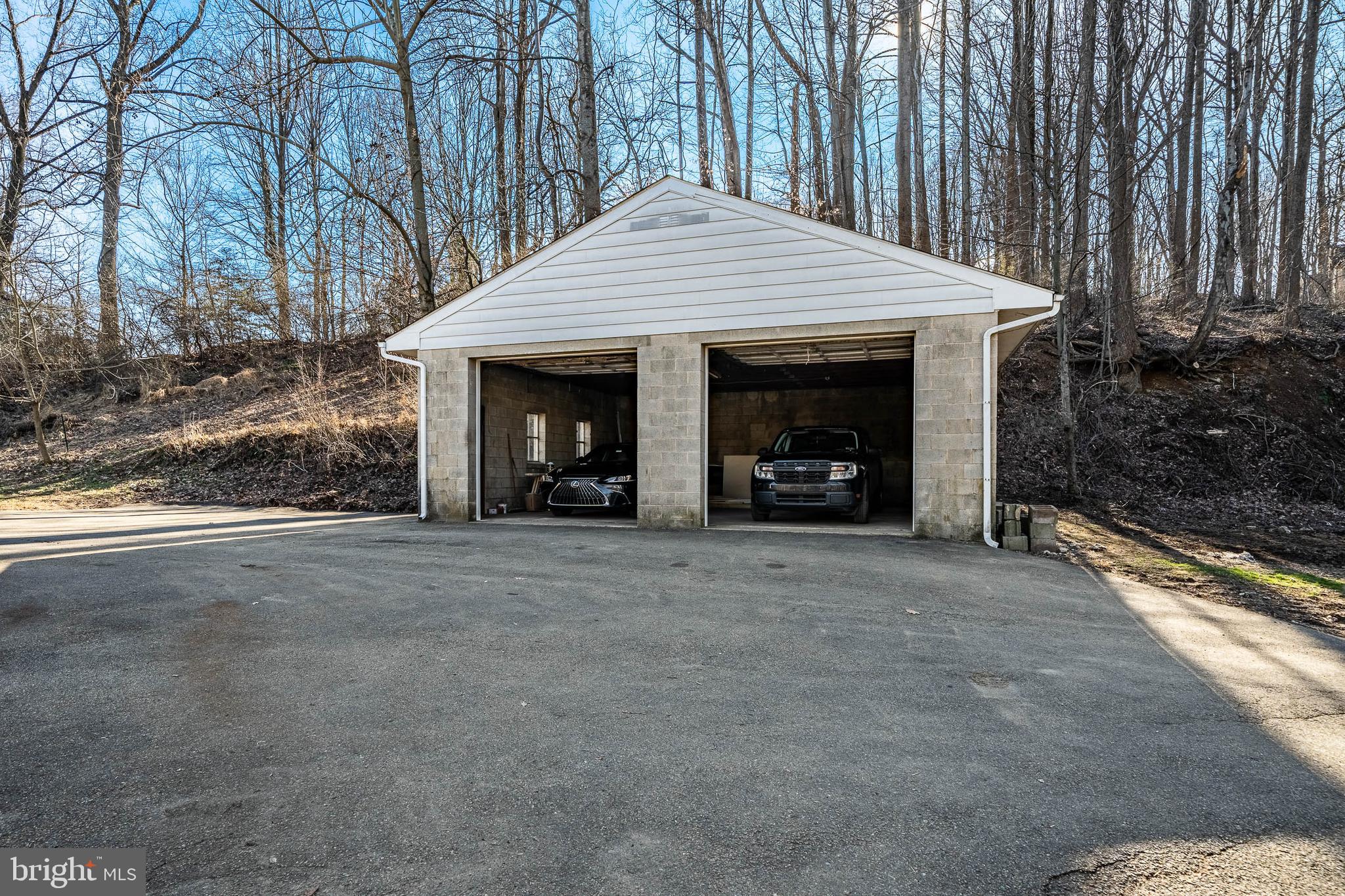 231 Laurel Bridge Road Landenberg, PA 19350 - Photo 51 of 57 a view of a house with yard and garage