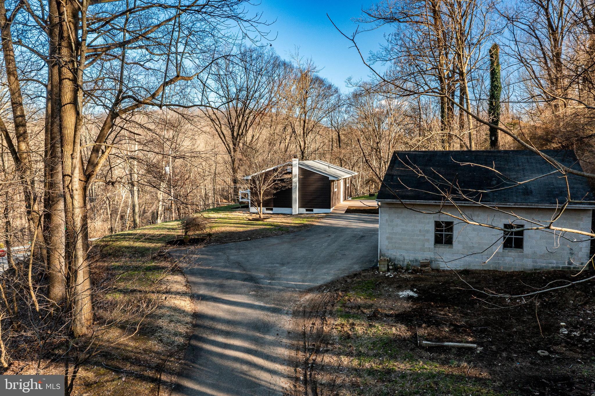 231 Laurel Bridge Road Landenberg, PA 19350 - Photo 52 of 57 a view of house with a yard