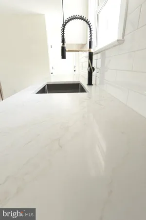 a close view of a faucet in the kitchen
