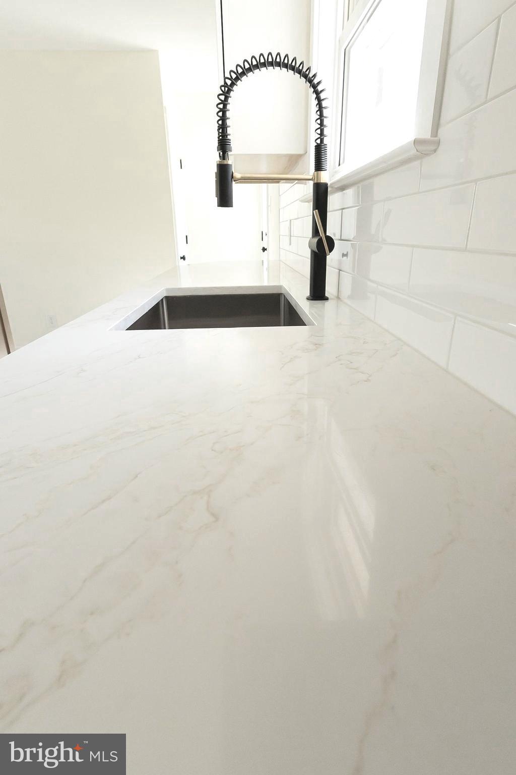 231 Laurel Bridge Road Landenberg, PA 19350 - Photo 7 of 57 a close view of a faucet in the kitchen