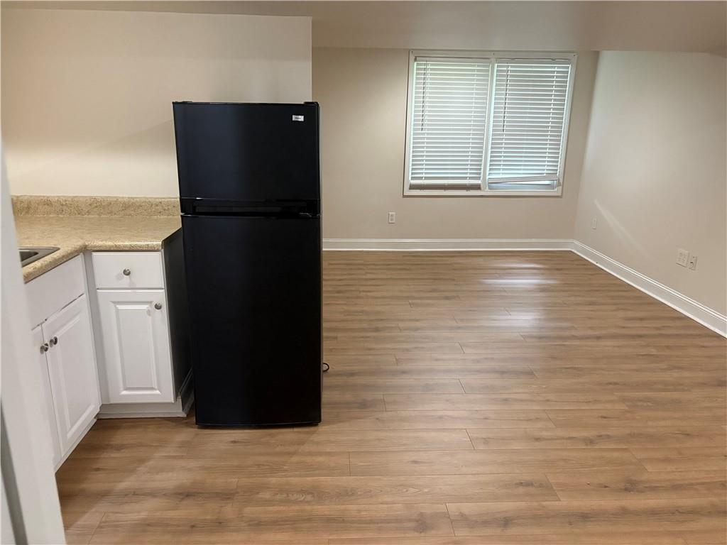 4747 Julian Way Acworth, GA 30101 - Photo 19 of 27 an empty room with wooden floor