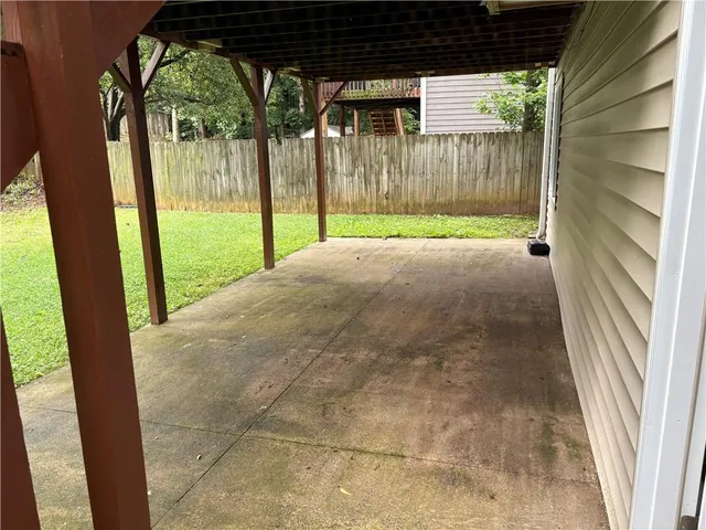 a view of backyard and porch