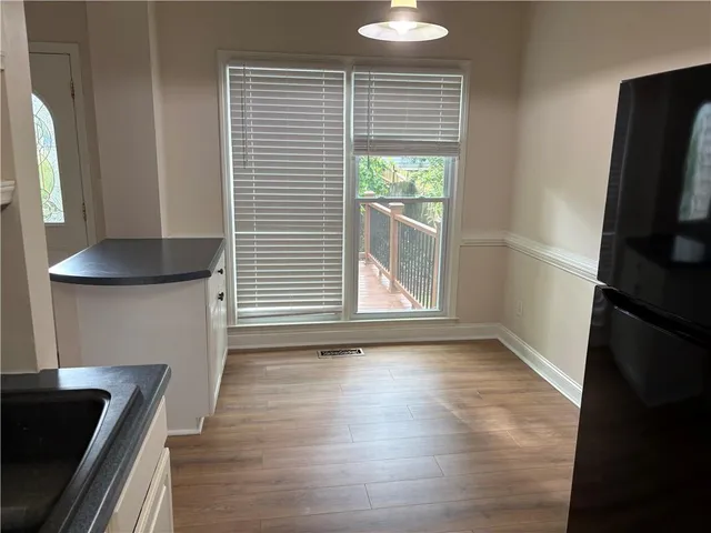 a view of livingroom with furniture and wooden floor