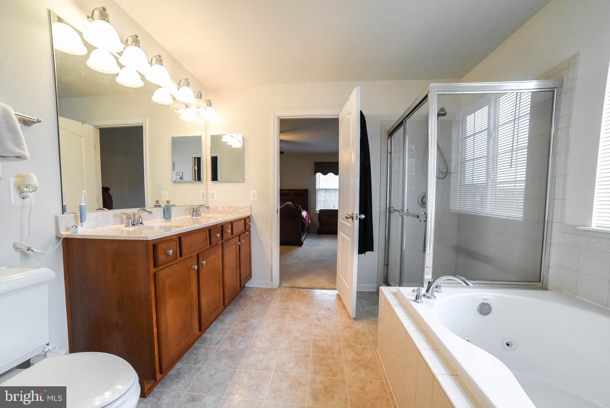 15319 Pulaski Road Brandywine, MD 20613 - Photo 12 of 30 Master bathroom with dual sinks,
