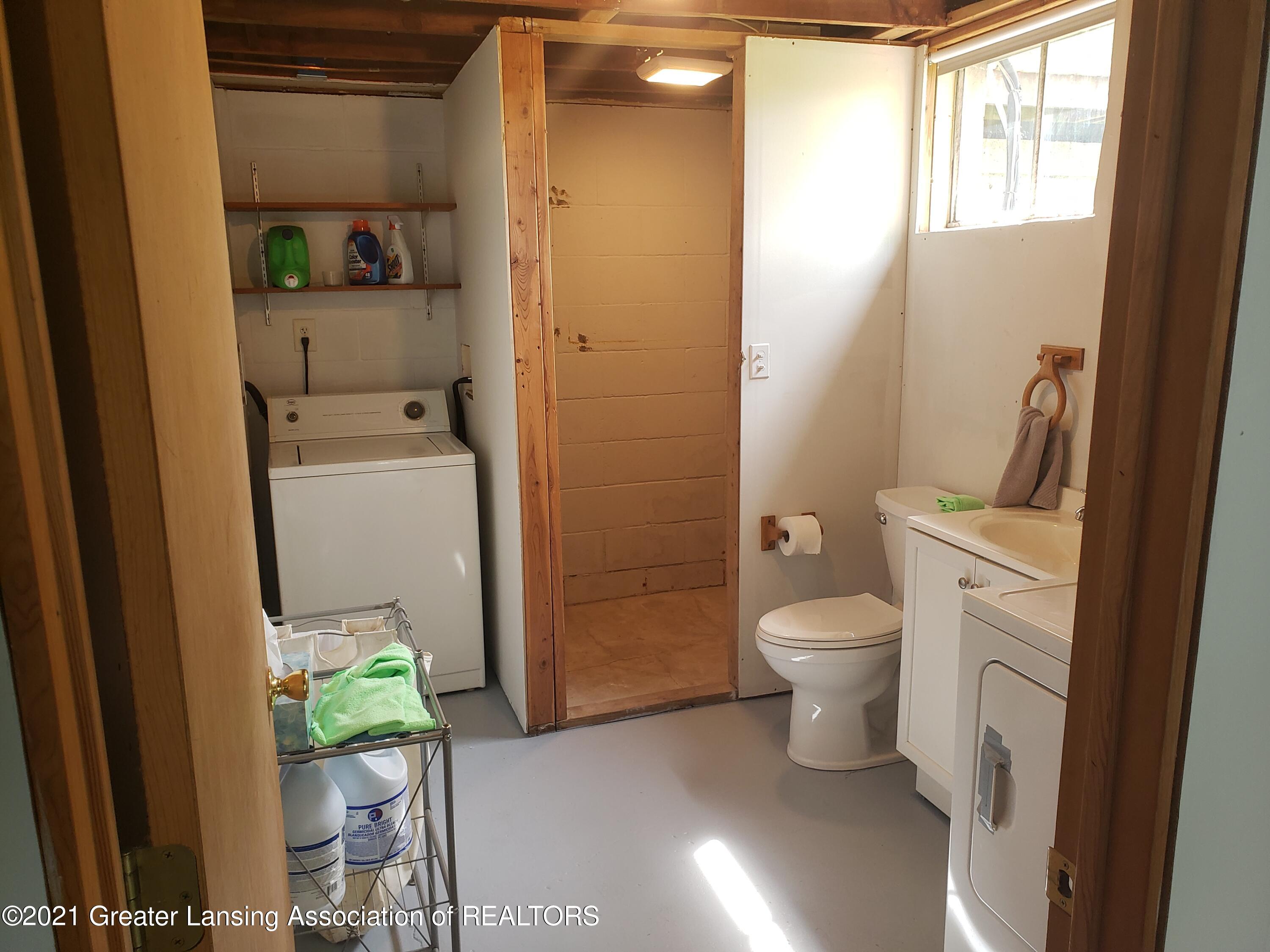 2205 North Canal Road Lansing, MI 48917 - Photo 24 of 31 Lower Level Bath & Laundry