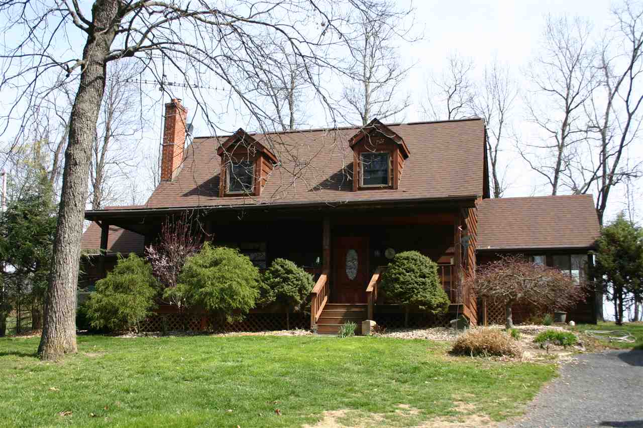3335 Beulah Road Keezletown, VA 22832 - Photo 1 of 24 a view of a house with a yard and plants