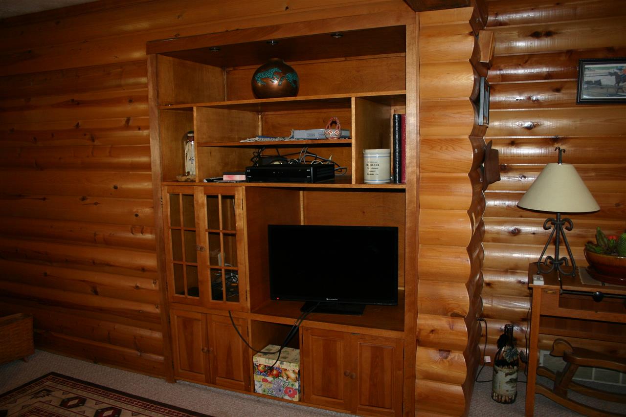 3335 Beulah Road Keezletown, VA 22832 - Photo 20 of 24 a room with wooden floor and flat screen tv
