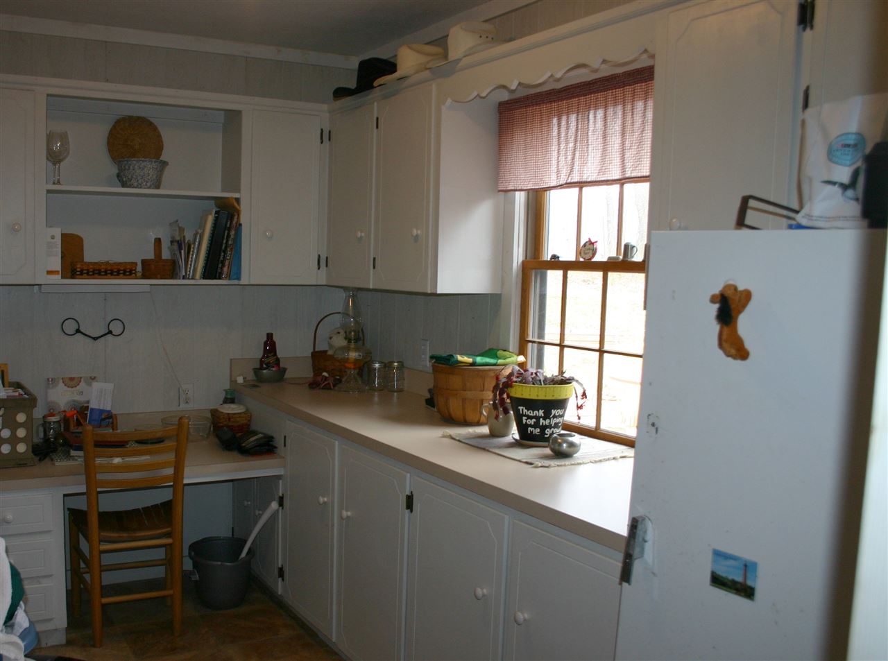 3335 Beulah Road Keezletown, VA 22832 - Photo 6 of 24 a kitchen with a sink cabinets and window