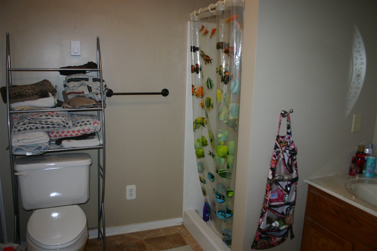 3335 Beulah Road Keezletown, VA 22832 - Photo 7 of 24 a bathroom with a toilet and a sink