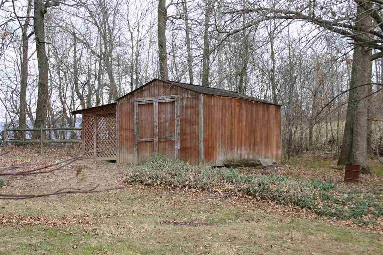 3335 Beulah Road Keezletown, VA 22832 - Photo 10 of 24 a front view of a house with garden