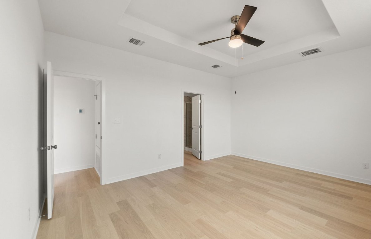 408 Sullivan Way Elgin, TX 78621 - Photo 13 of 22 wooden floor in an empty room