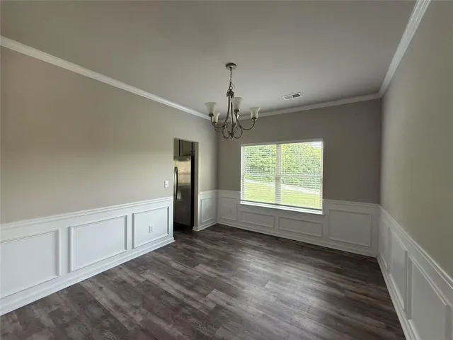 a view of an empty room with window