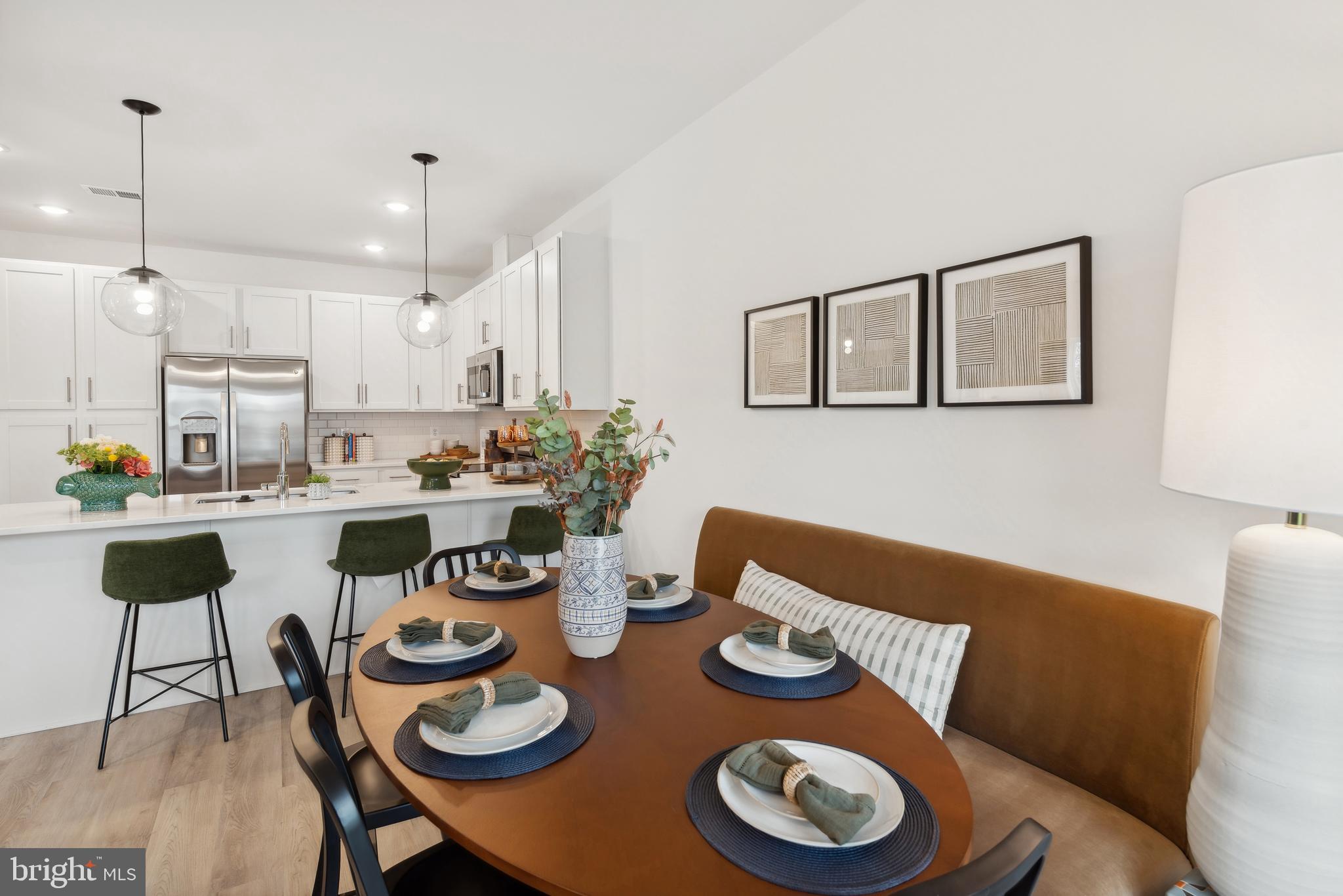 0 Cougar Lane Locust Grove, VA 22508 - Photo 13 of 30 a kitchen with a dining table and chairs