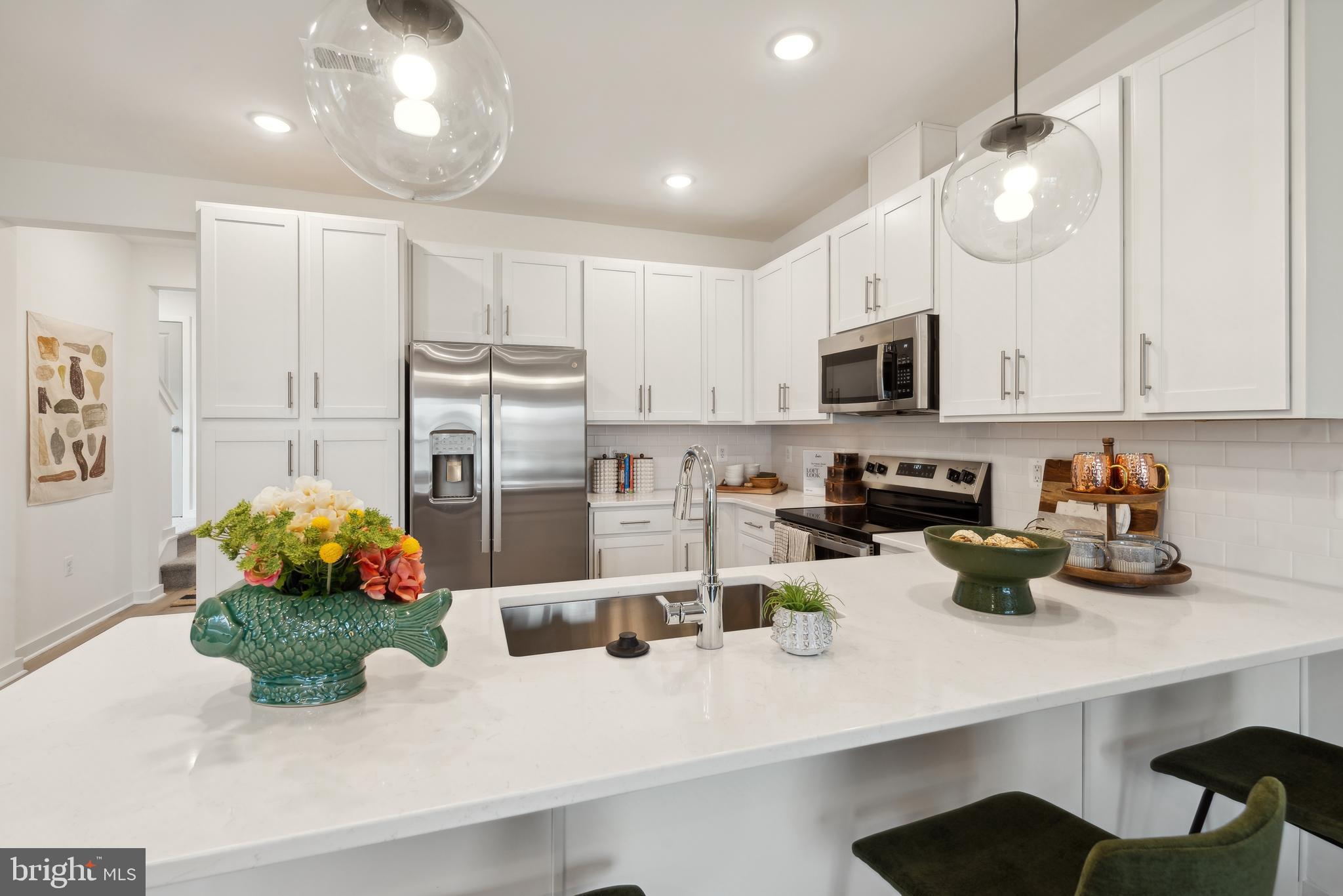 0 Cougar Lane Locust Grove, VA 22508 - Photo 8 of 30 a kitchen with sink a microwave and cabinets