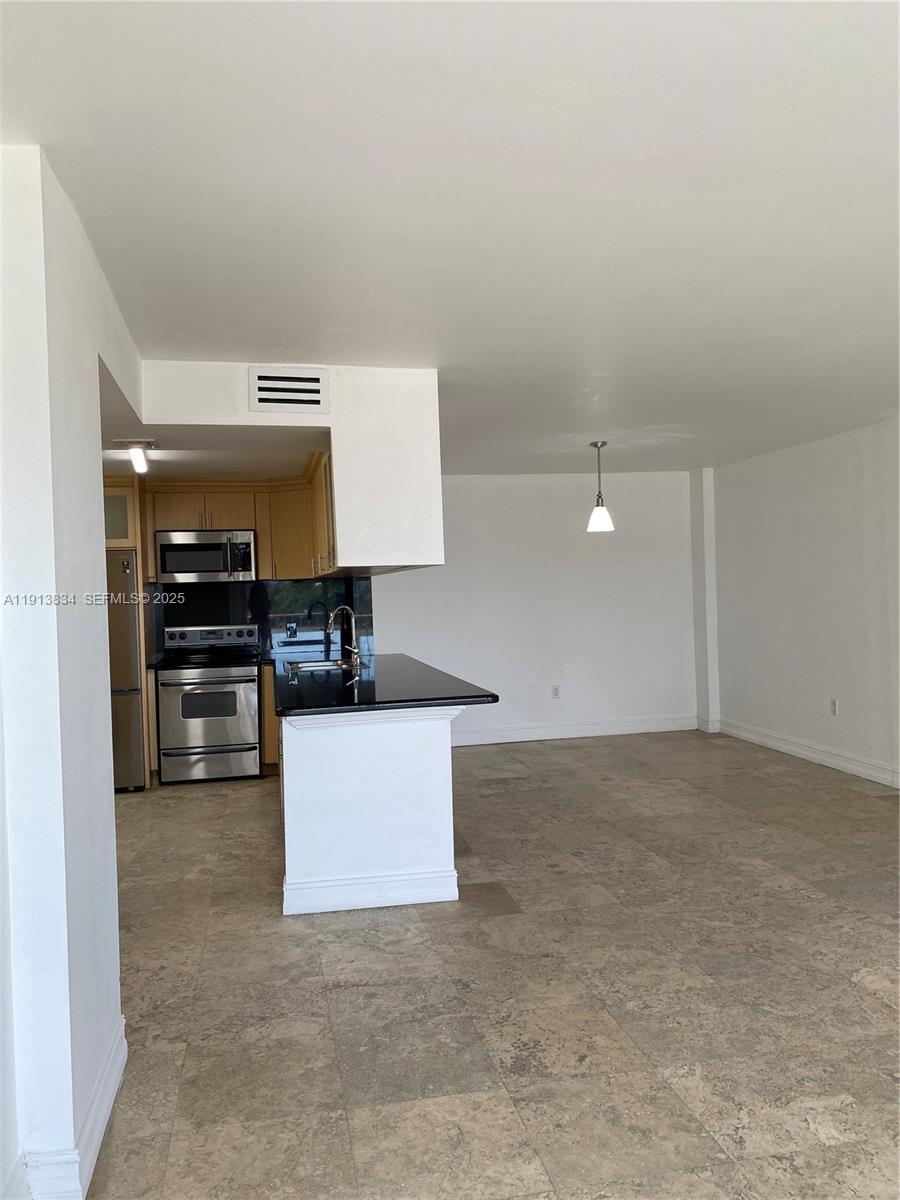 177 Ocean Ln Drive, Unit 505 Key Biscayne, FL 33149 - Photo 11 of 26 a view of kitchen with cabinets