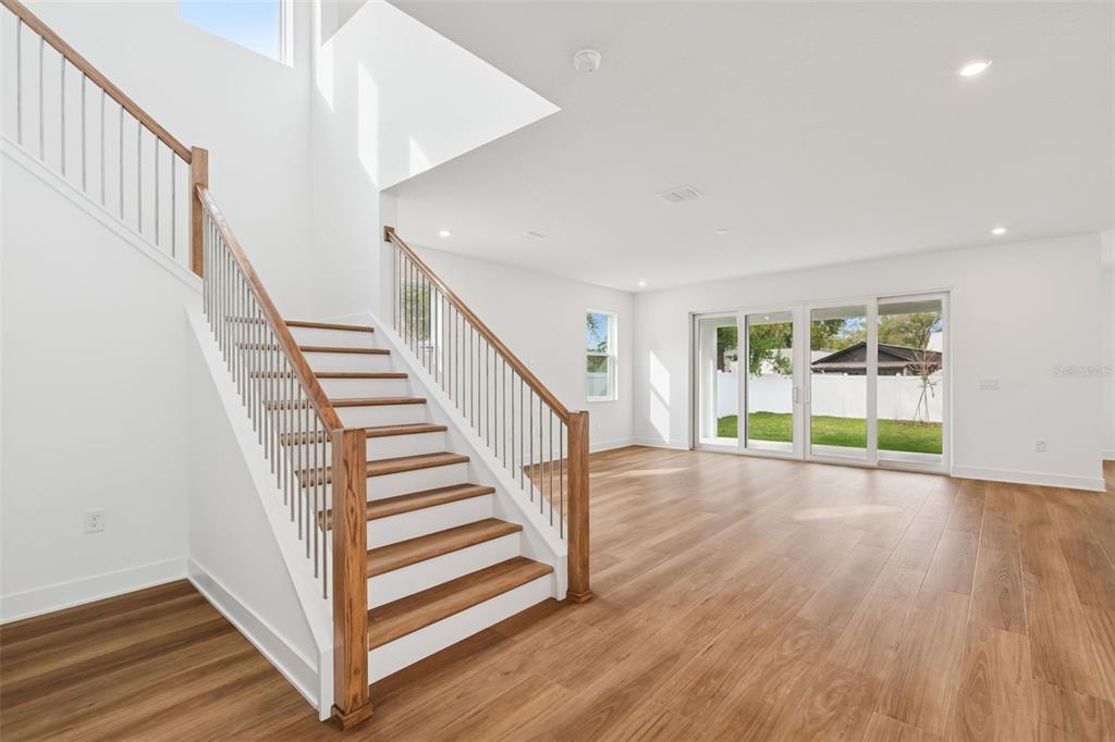 809 West Indiana Avenue Tampa, FL 33603 - Photo 12 of 64 a view of entryway with wooden floor and stairs