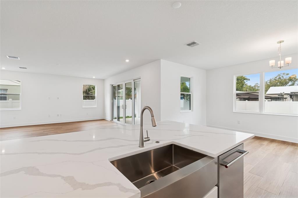 809 West Indiana Avenue Tampa, FL 33603 - Photo 33 of 64 a kitchen with a sink and a microwave