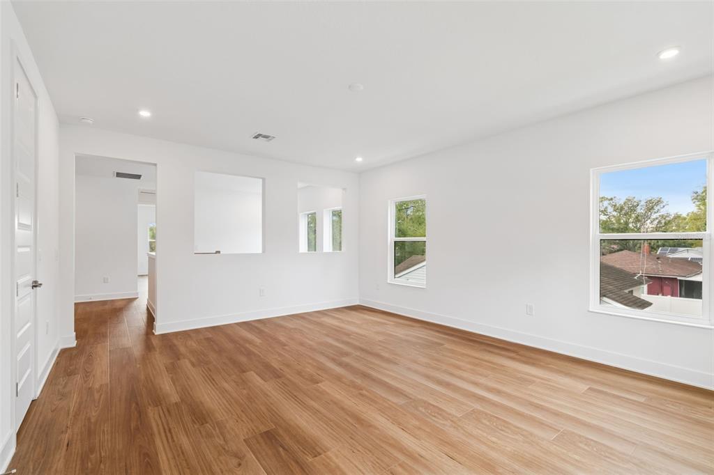 809 West Indiana Avenue Tampa, FL 33603 - Photo 43 of 64 a view of empty room with wooden floor and fan