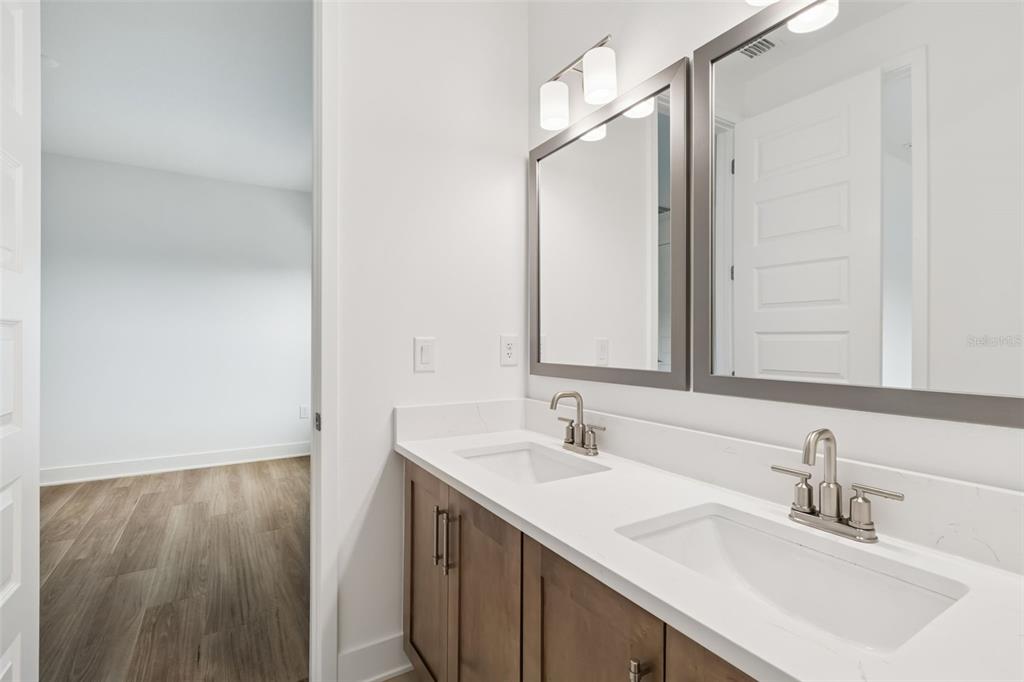 809 West Indiana Avenue Tampa, FL 33603 - Photo 49 of 64 a bathroom with a sink and a mirror