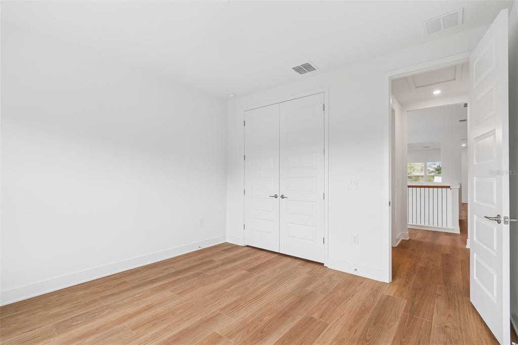 809 West Indiana Avenue Tampa, FL 33603 - Photo 55 of 64 a view of empty room with wooden floor