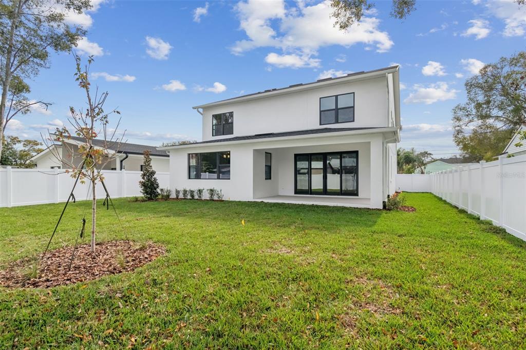 809 West Indiana Avenue Tampa, FL 33603 - Photo 59 of 64 a view of a house with a backyard