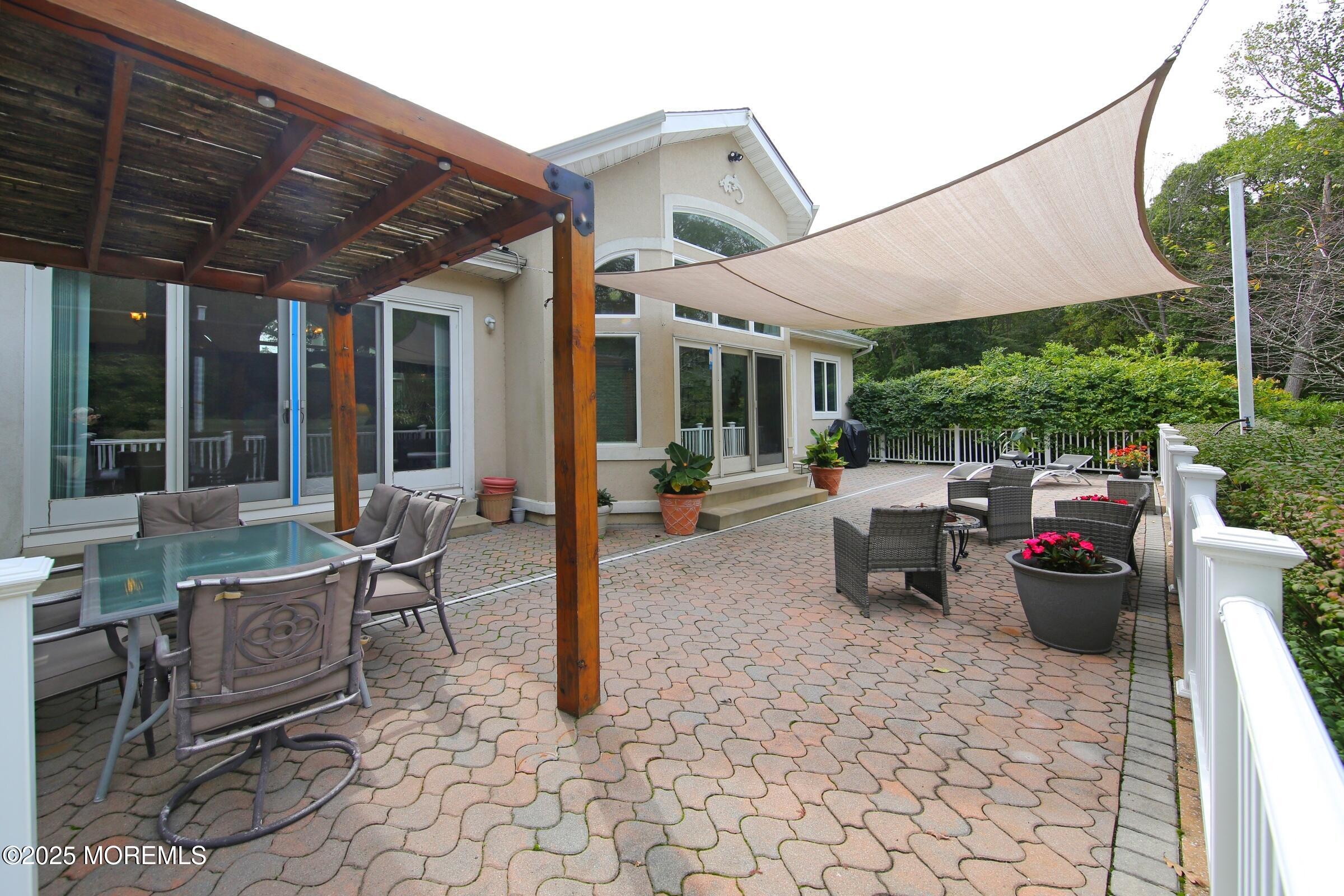 15 Gun Club Road Tinton Falls, NJ 07712 - Photo 26 of 51 Raised paver patio