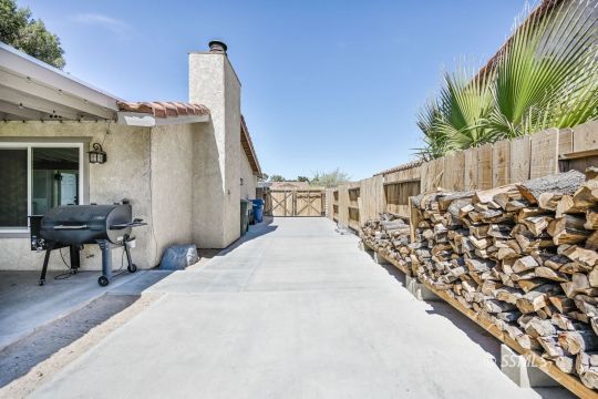 725 West Howell Avenue Ridgecrest, CA 93555 - Photo 35 of 35 a front view of a house with a yard