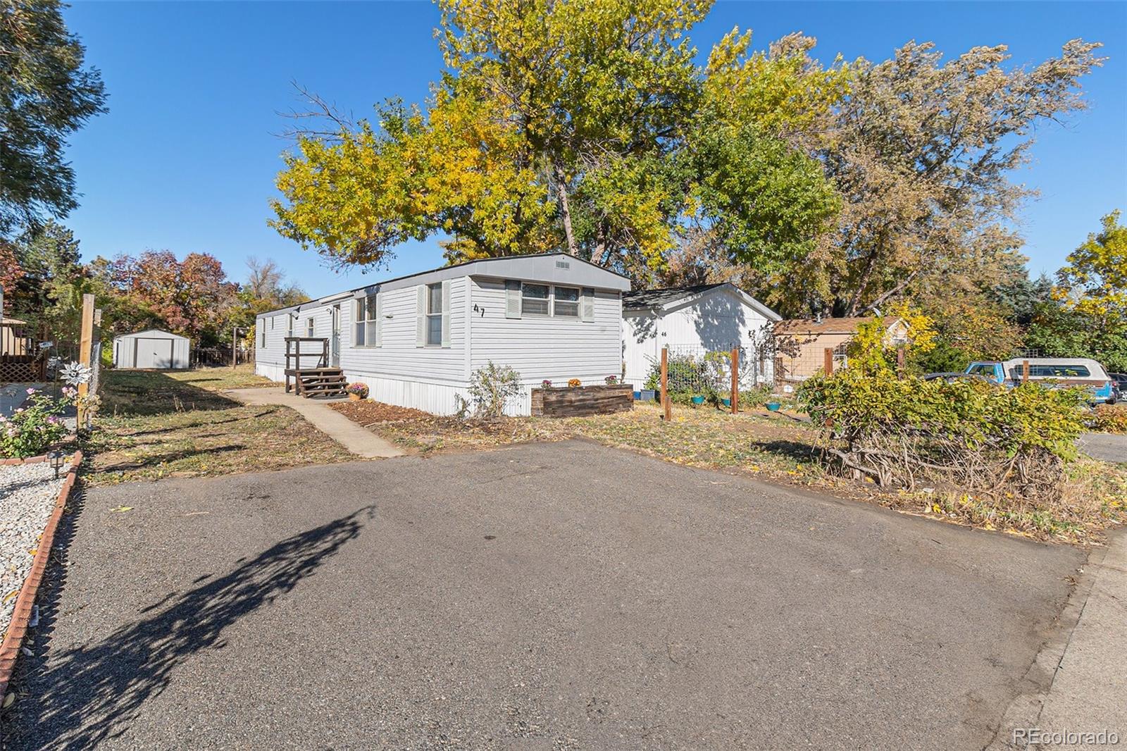 400 West South Boulder Road Louisville, CO 80027 - Photo 2 of 24 front view of a house with a street