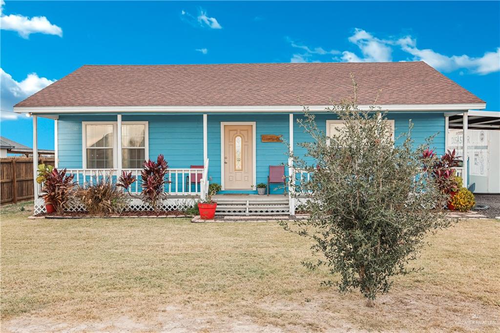 10514 Crocosmia Lane Edcouch, TX 78538 - Photo 2 of 22 a front view of a house with a porch