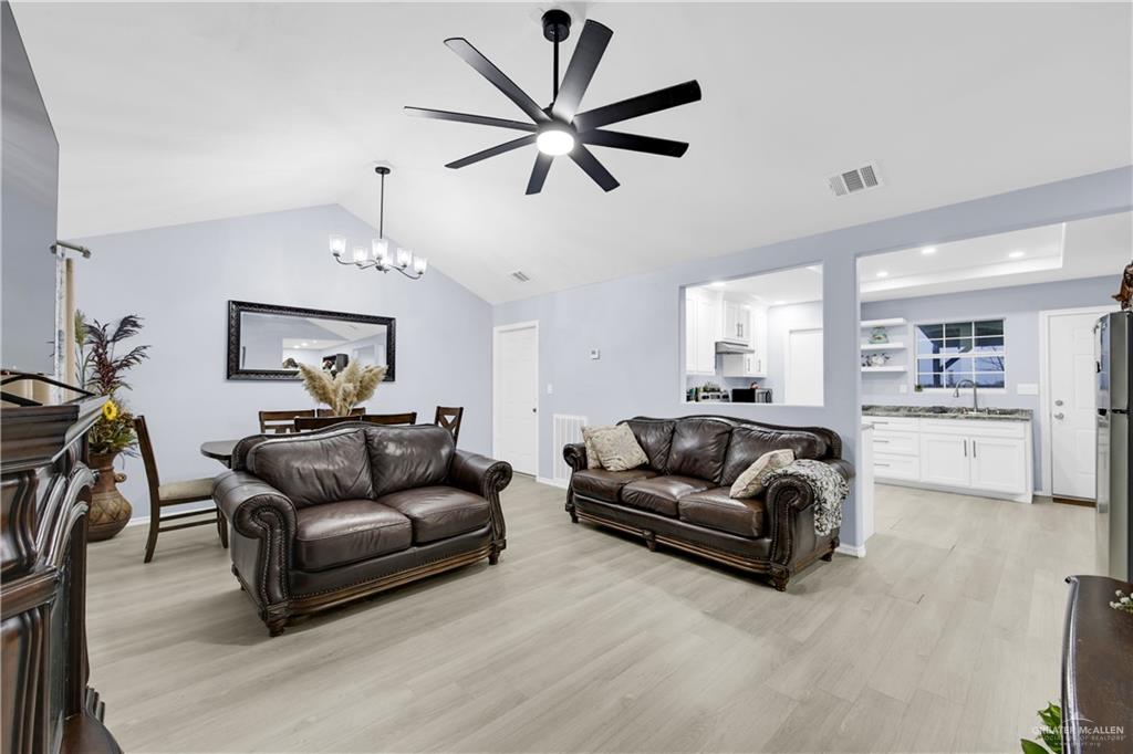 10514 Crocosmia Lane Edcouch, TX 78538 - Photo 6 of 22 a living room with furniture and a large window